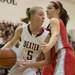 Dexter's Riley McDonald drives the ball as she tries to make a basket against Canton during the first half the regional semifinal game at Novi High School Tuesday, Mar. 5th.
Courtney Sacco I AnnArbor.com  